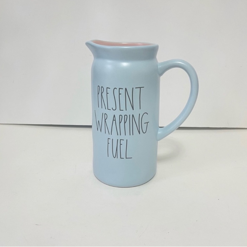 Rae Done  pitcher light grayish blue